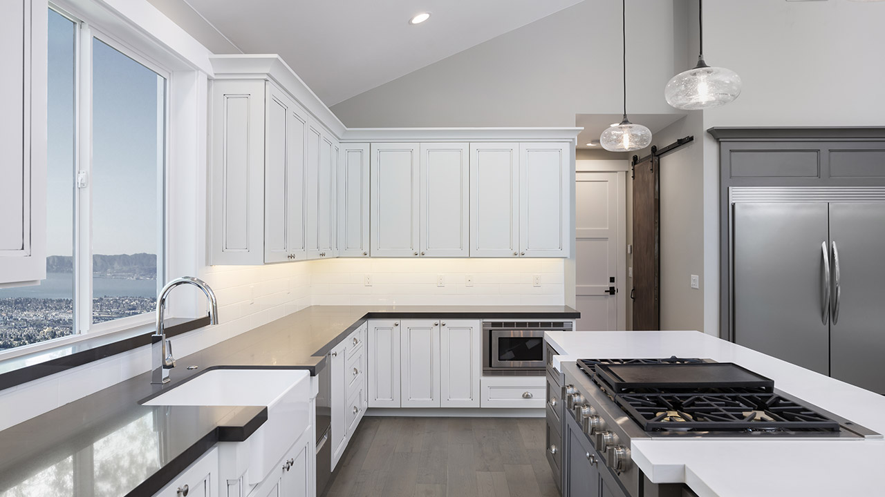 Should You Stain Or Paint Your Kitchen Cabinets For A Change In